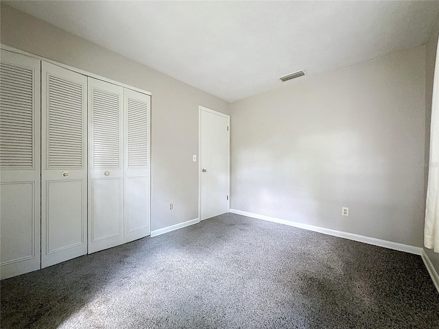 unfurnished bedroom with a closet