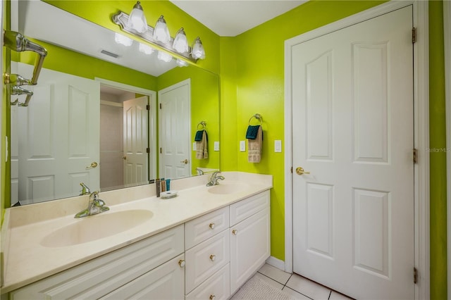 bathroom featuring vanity and tile patterned floors