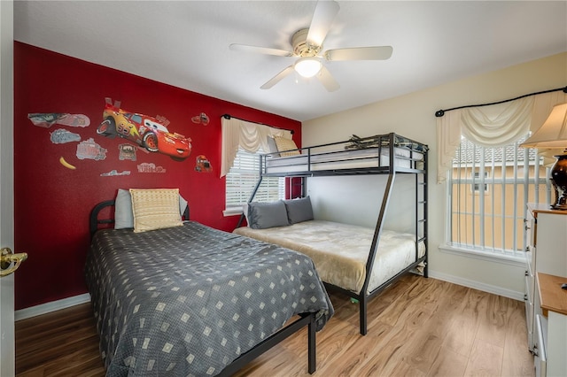 bedroom featuring ceiling fan and wood-type flooring