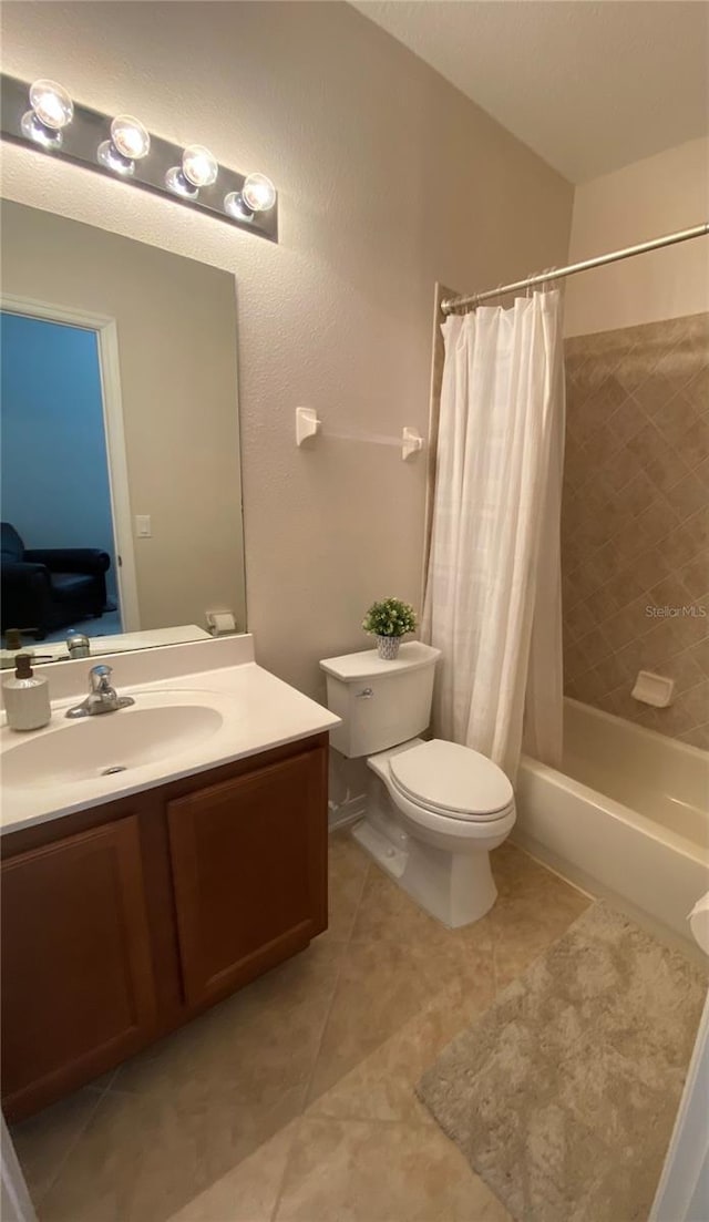 full bathroom with toilet, shower / bath combination with curtain, tile patterned floors, and vanity