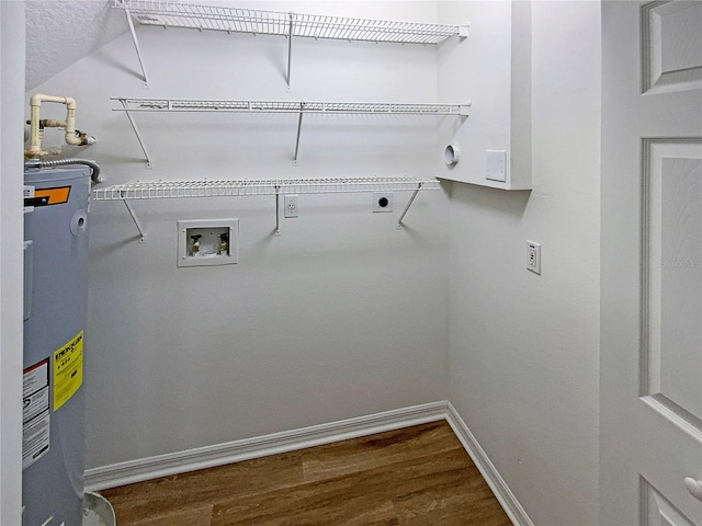 laundry area with washer hookup, electric water heater, electric dryer hookup, and hardwood / wood-style flooring