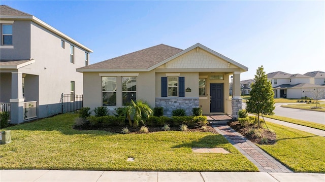 view of front facade with a front lawn