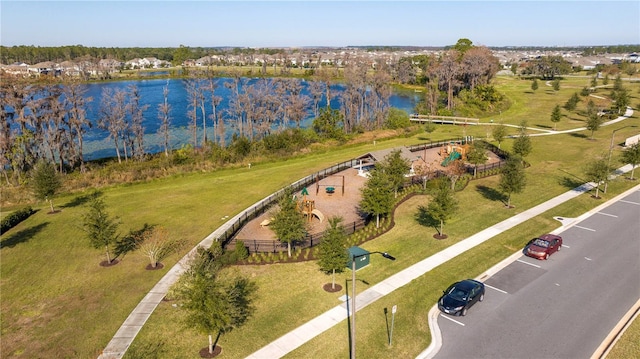 birds eye view of property featuring a water view