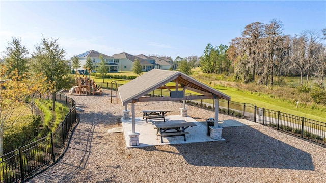 view of property's community with a gazebo and a playground