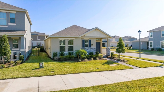 view of front of home featuring a front lawn