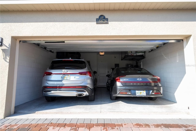 garage featuring a garage door opener