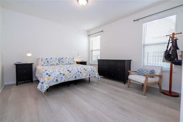 bedroom featuring light wood-type flooring