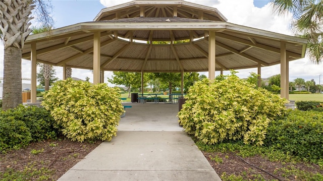 view of parking / parking lot featuring a gazebo