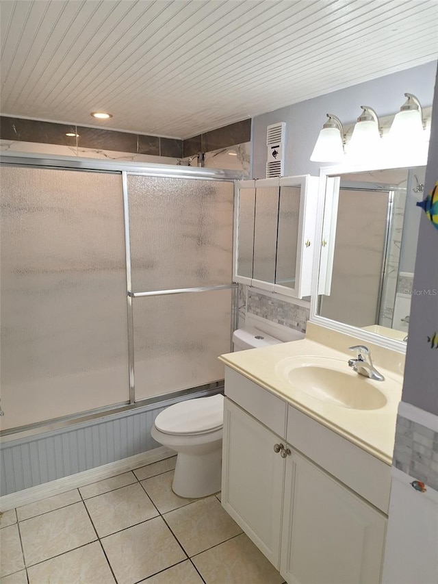 full bathroom with combined bath / shower with glass door, toilet, tile patterned floors, vanity, and wood ceiling