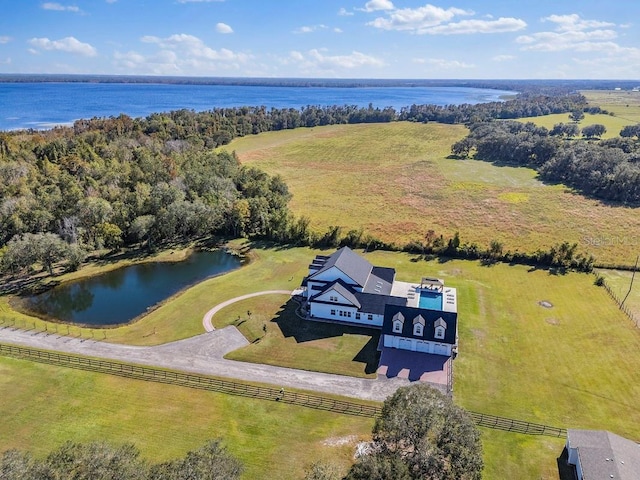 bird's eye view with a rural view and a water view