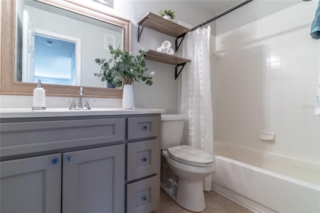 full bath featuring toilet, tile patterned flooring, vanity, and shower / tub combo with curtain