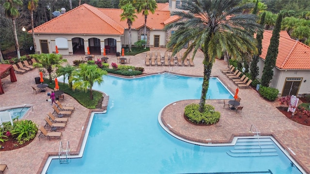 view of pool featuring a patio