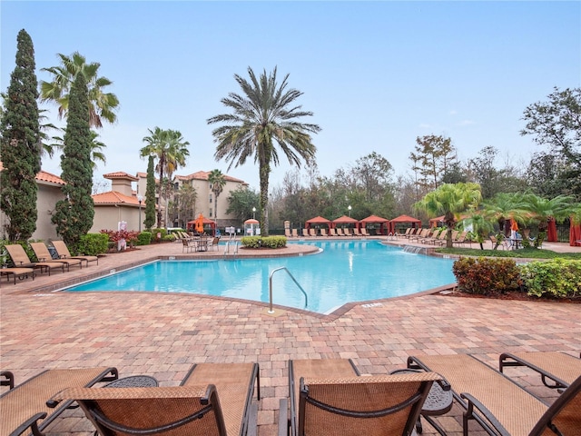 view of swimming pool featuring a patio area