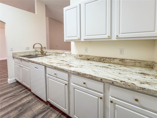 kitchen with dishwashing machine, dark wood-type flooring, sink, and white cabinetry