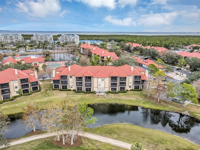 drone / aerial view with a water view