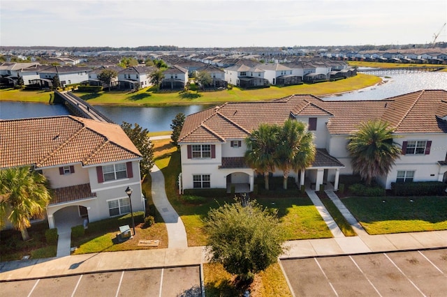 drone / aerial view featuring a water view