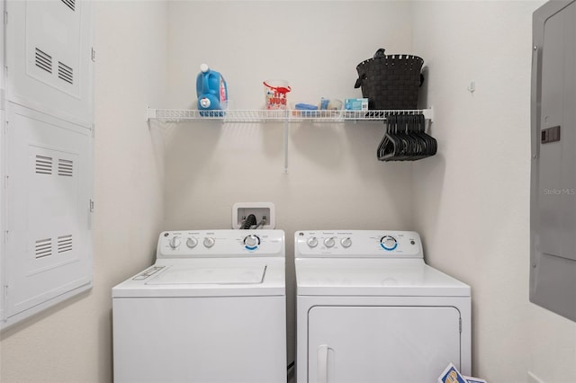 laundry room featuring washing machine and dryer