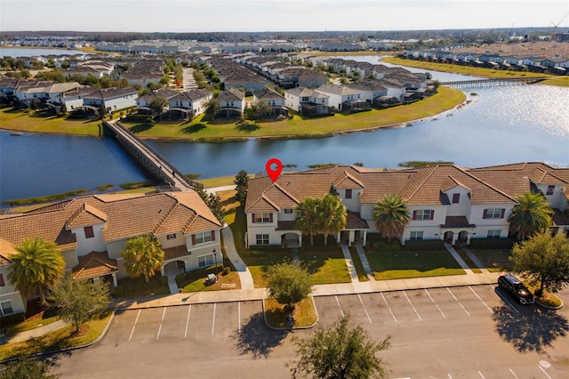 drone / aerial view featuring a water view