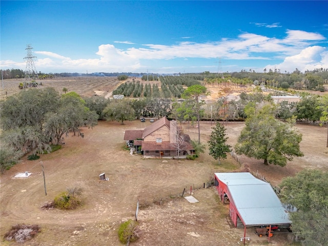 birds eye view of property featuring a rural view