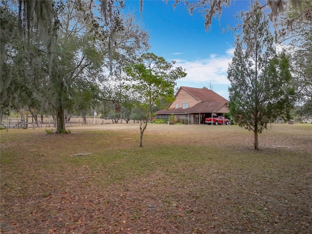 view of yard with a carport