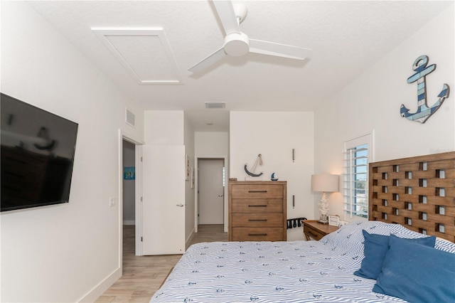 bedroom featuring ceiling fan and light wood-type flooring