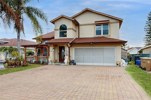 view of front of home with a garage