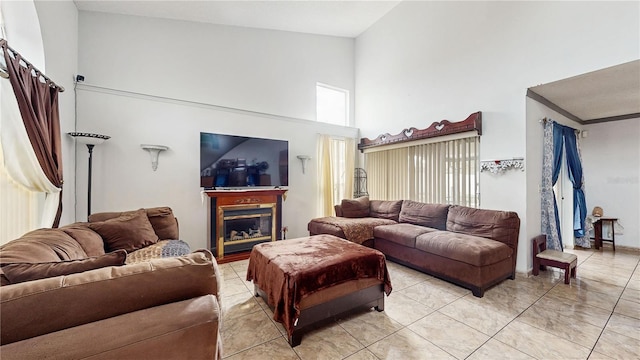 living room with high vaulted ceiling