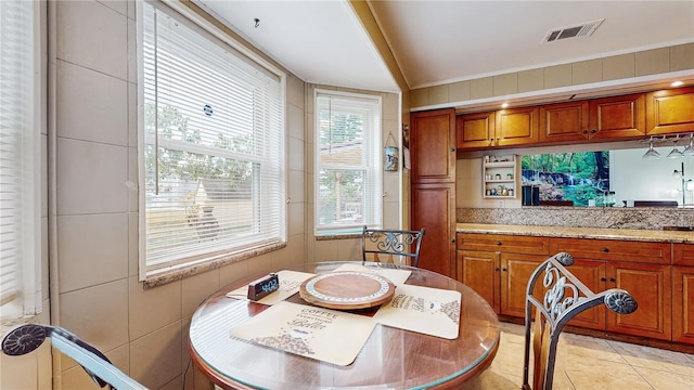 view of tiled dining space