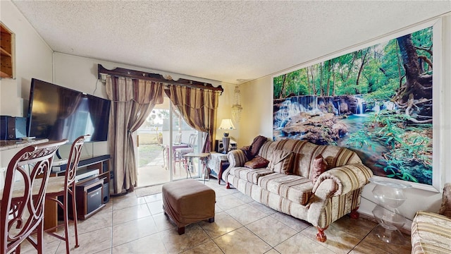 living room with light tile patterned floors and a textured ceiling