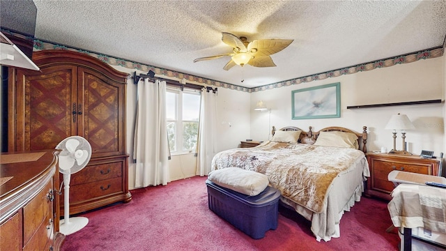 bedroom featuring ceiling fan, carpet, and a textured ceiling