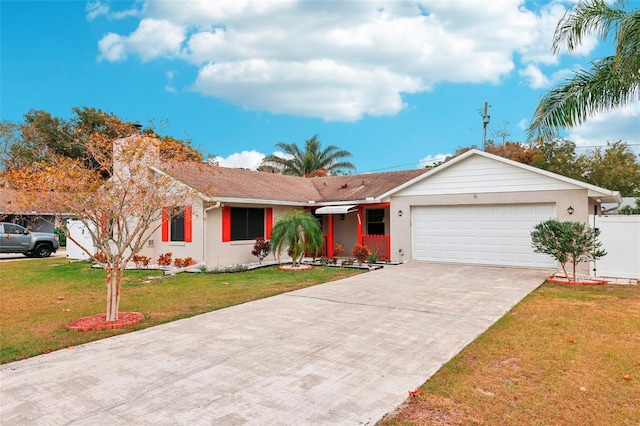 ranch-style home featuring a front lawn and a garage