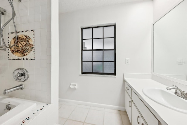 bathroom featuring a textured ceiling, tile patterned floors, vanity, and tiled shower / bath combo