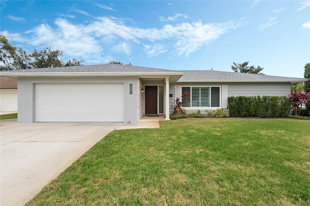 ranch-style house with a front yard and a garage