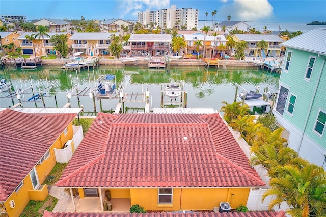 bird's eye view with a water view