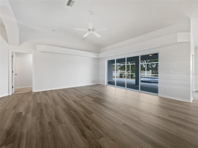 unfurnished room featuring ceiling fan, dark hardwood / wood-style floors, and high vaulted ceiling