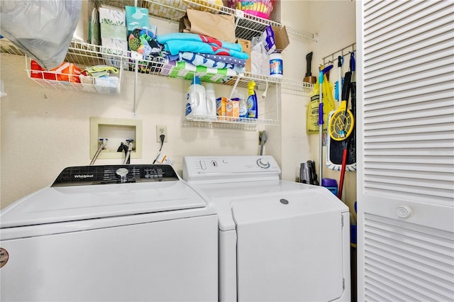 laundry area with separate washer and dryer