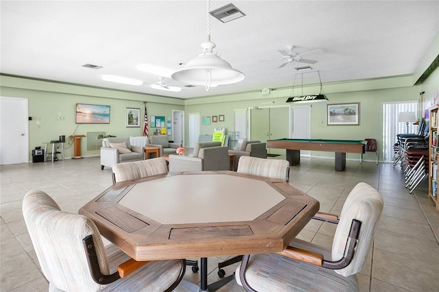 dining room featuring pool table, ceiling fan, and light tile patterned flooring