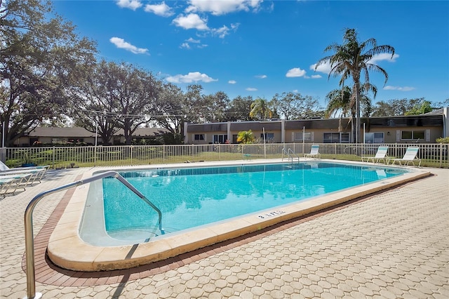 view of swimming pool featuring a patio