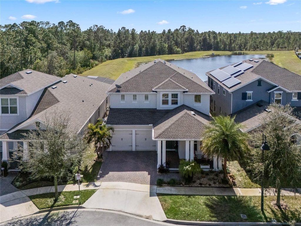 birds eye view of property featuring a water view