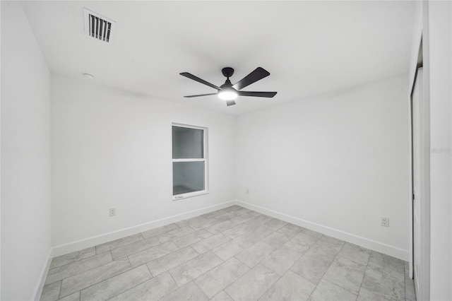 unfurnished room with ceiling fan