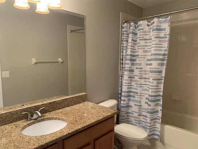 full bathroom featuring toilet, vanity, and shower / bathtub combination with curtain