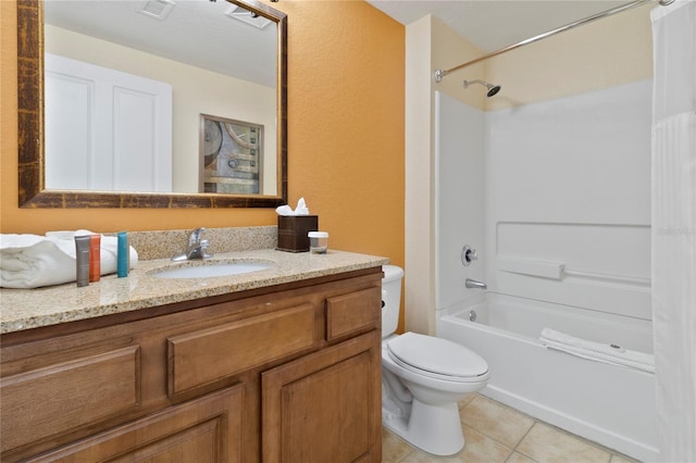 full bathroom featuring toilet, tile patterned flooring, vanity, and shower / bath combination