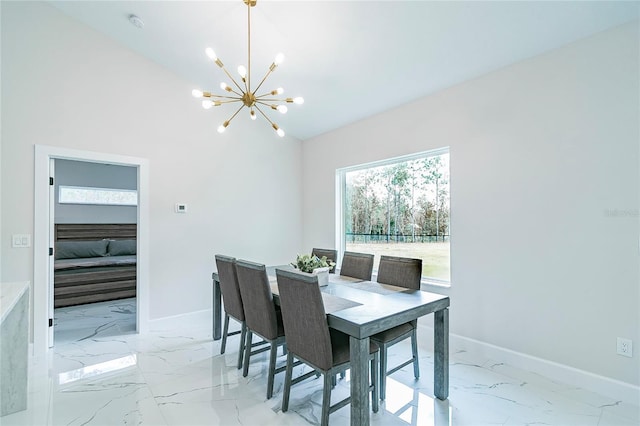 dining space featuring an inviting chandelier