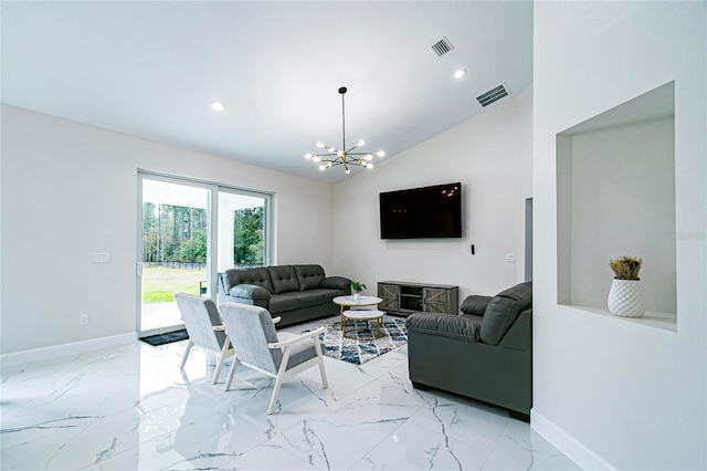 living room featuring lofted ceiling and an inviting chandelier