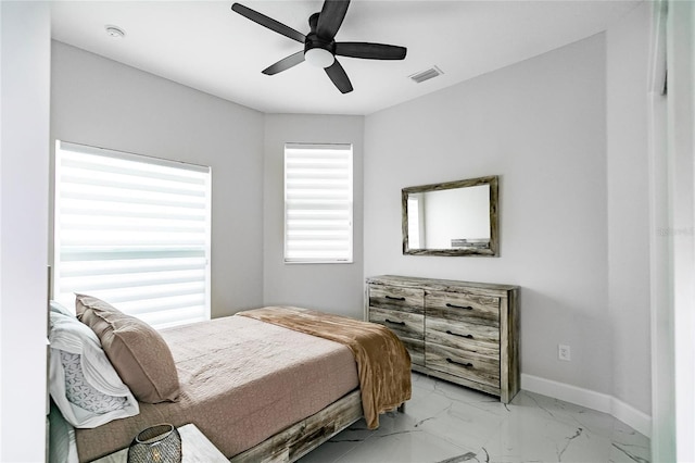 bedroom featuring ceiling fan