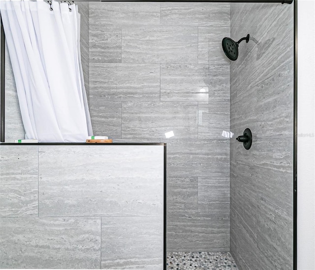 bathroom featuring curtained shower