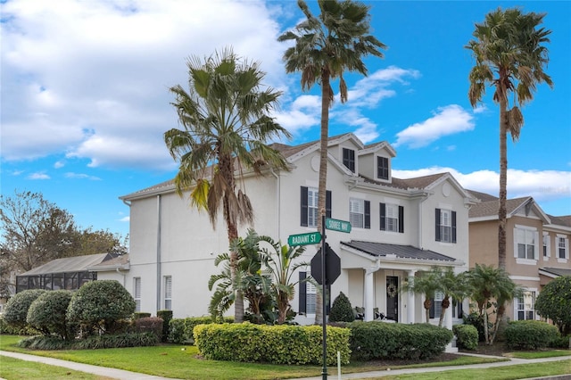 view of front of home with a front lawn