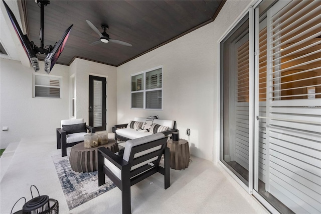 view of patio with ceiling fan and an outdoor hangout area