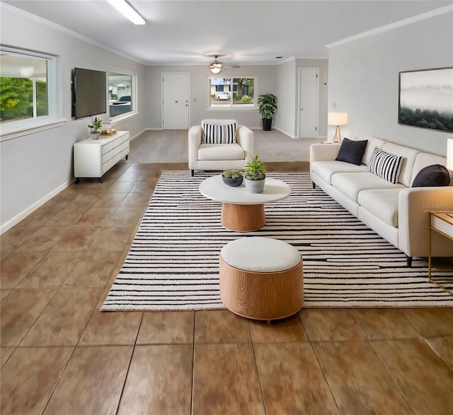 living room with light tile patterned floors, ornamental molding, and ceiling fan