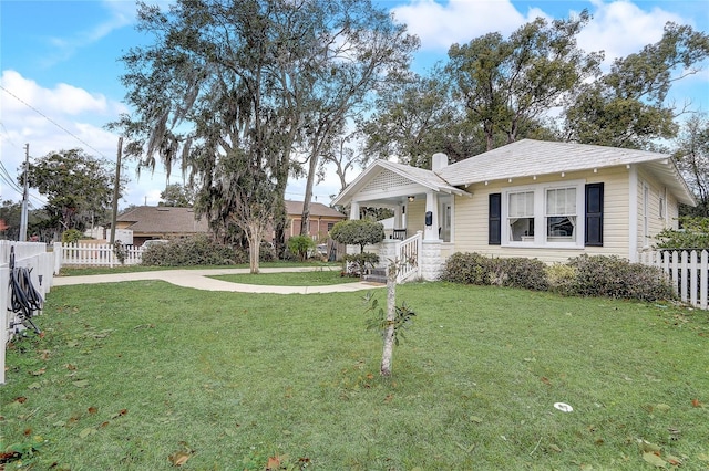 view of front of home with a front yard